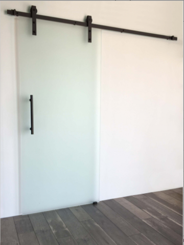 Glazen schuifdeur industrieel