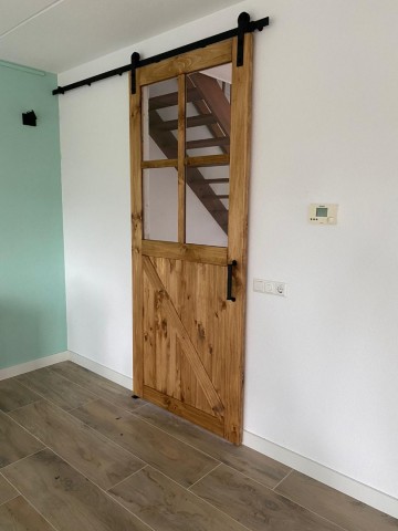 Grenen schuifdeur met glas old brown