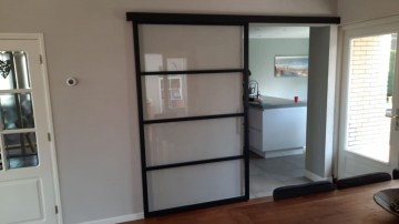 Stalen schuifwand binnen